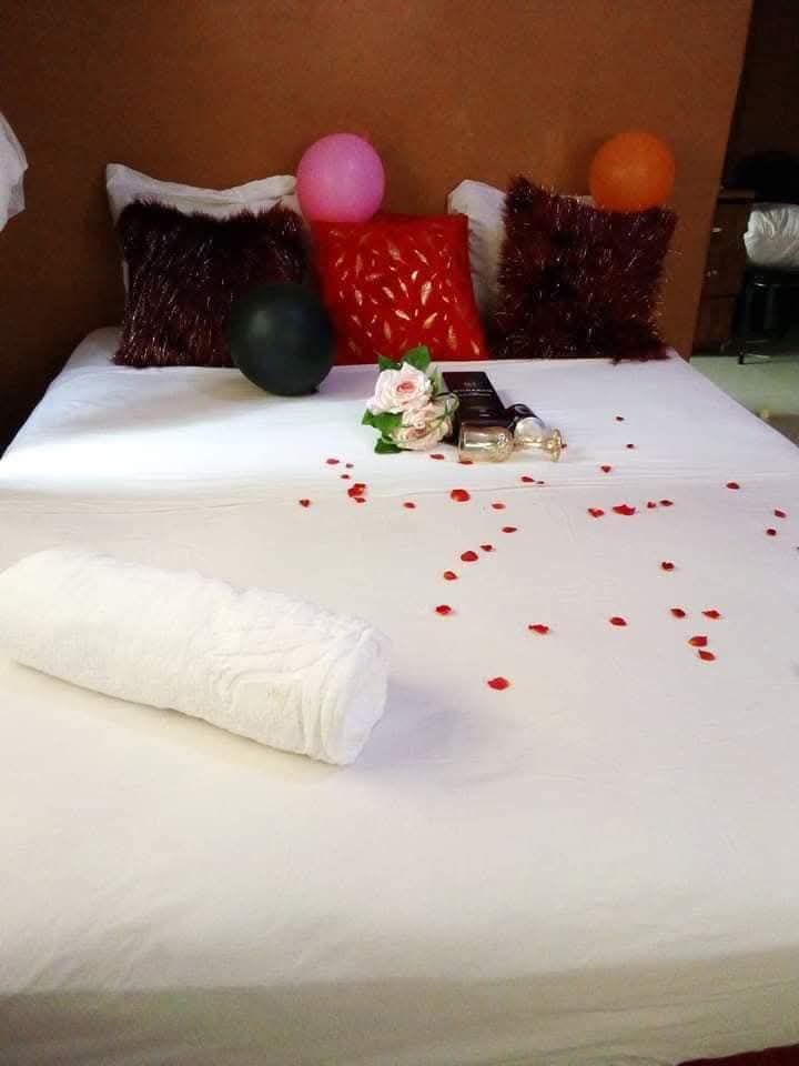 Comfortable bedroom interior at Jojomo Guest House